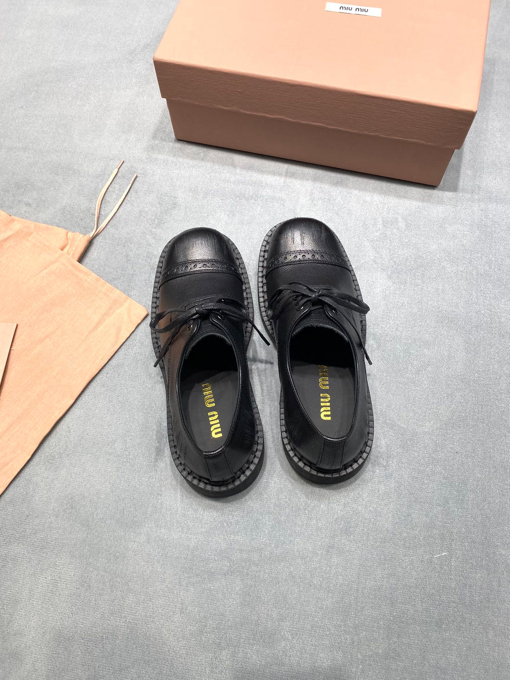MIUMIU 26S LACE-UP LOAFERS IN BLACK GRAINED CALFSKIN