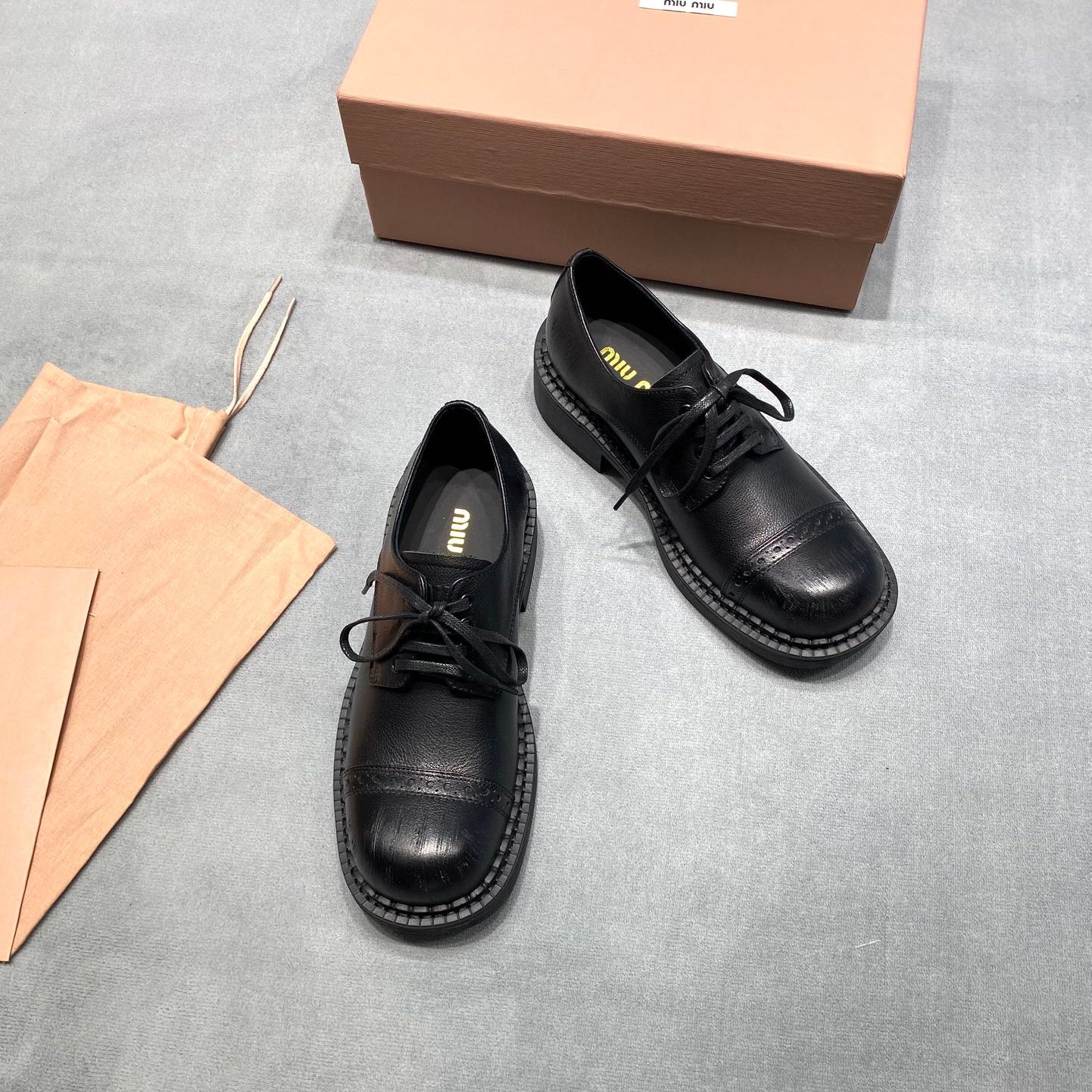 MIUMIU 26S LACE-UP LOAFERS IN BLACK GRAINED CALFSKIN