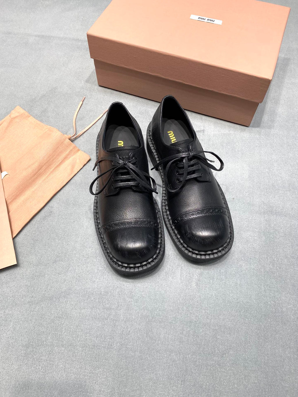 MIUMIU 26S LACE-UP LOAFERS IN BLACK GRAINED CALFSKIN