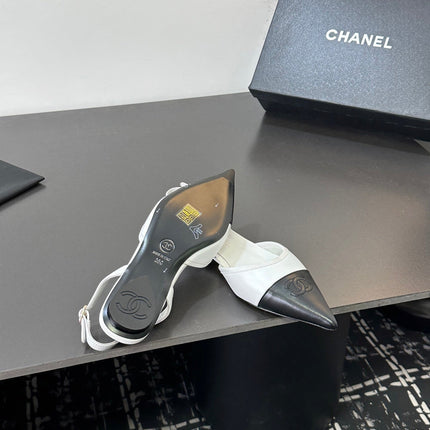 CHANEL 26S POINTED-TOE SLINGBACKS IN WHITE AND BLACK LAMBSKIN