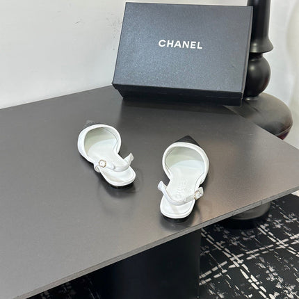 CHANEL 26S POINTED-TOE SLINGBACKS IN WHITE AND BLACK LAMBSKIN