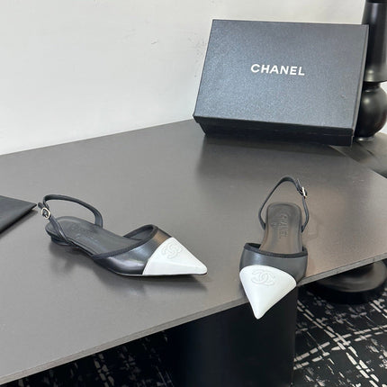 CHANEL 26S SLINGBACK FLATS IN BLACK AND WHITE LAMBSKIN