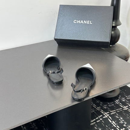 CHANEL 26S SLINGBACK FLATS IN BLACK AND WHITE LAMBSKIN