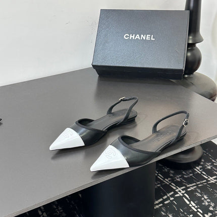 CHANEL 26S SLINGBACK FLATS IN BLACK AND WHITE LAMBSKIN