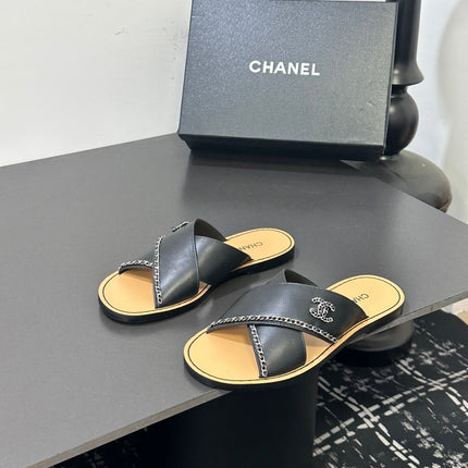 CHANEL 26S CROSS-STRAP SANDALS IN BLACK LEATHER