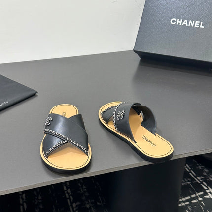 CHANEL 26S CROSS-STRAP SANDALS IN BLACK LEATHER