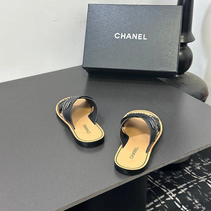 CHANEL 26S CROSS-STRAP SANDALS IN BLACK LEATHER