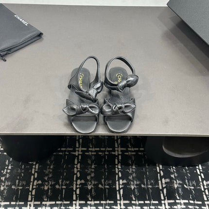 CHANEL 26S BOW SANDALS IN BLACK CALFSKIN