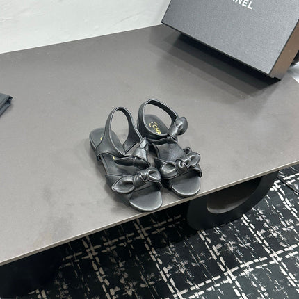CHANEL 26S BOW SANDALS IN BLACK CALFSKIN
