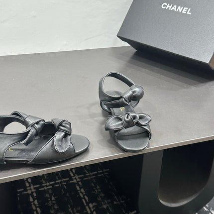 CHANEL 26S BOW SANDALS IN BLACK CALFSKIN