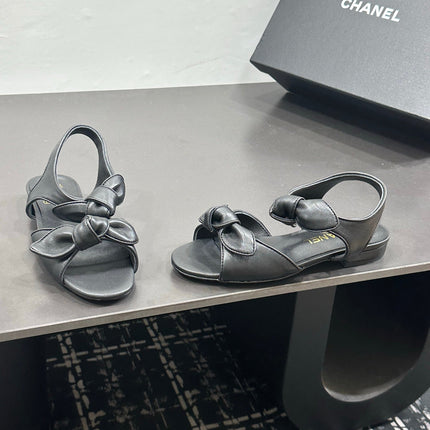 CHANEL 26S BOW SANDALS IN BLACK CALFSKIN