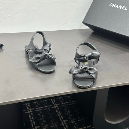 CHANEL 26S BOW SANDALS IN BLACK CALFSKIN