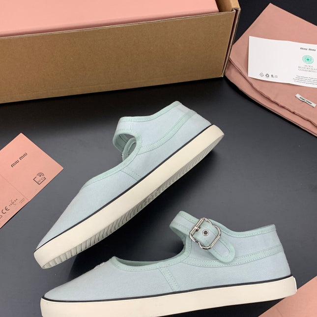 MIUMIU 26S MARY JANE FLATS IN PALE MINT CANVAS LOGO