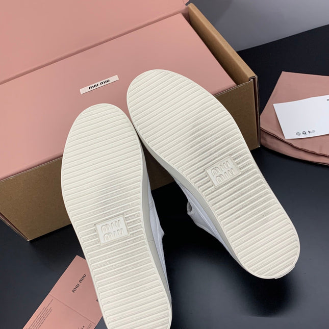 MIUMIU 26S MARY JANE FLATS IN WHITE CANVAS LOGO