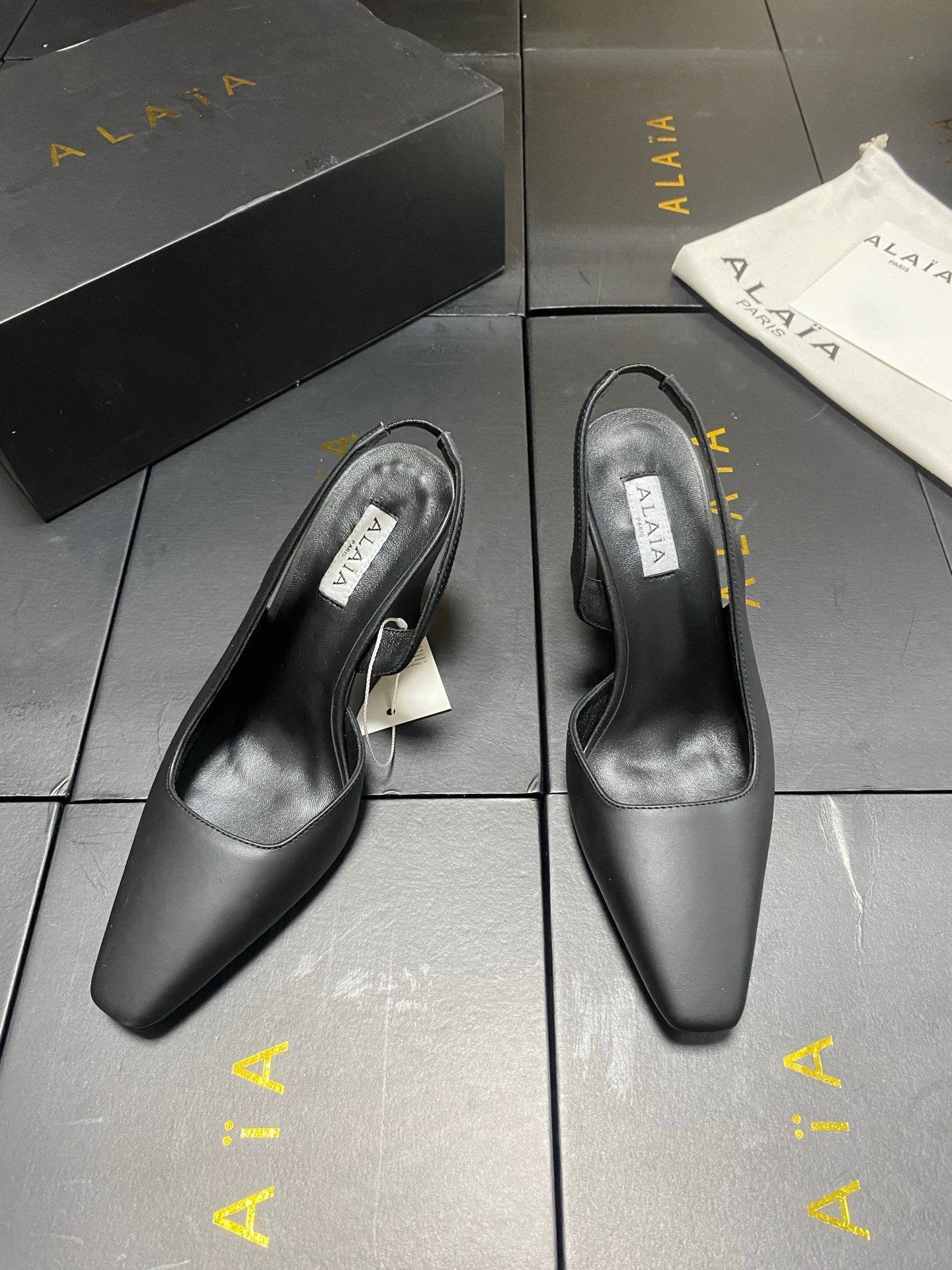 ALAIA 26S WEDGE SLINGBACKS 95 MM IN BLACK CALFSKIN
