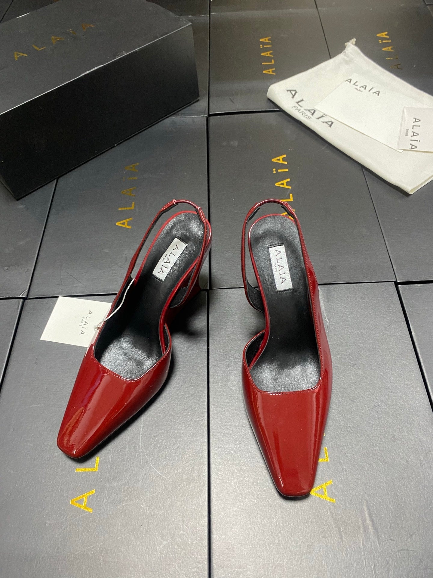 ALAIA 26S WEDGE SLINGBACKS 95 MM IN DARK RED PATENT CALFSKIN