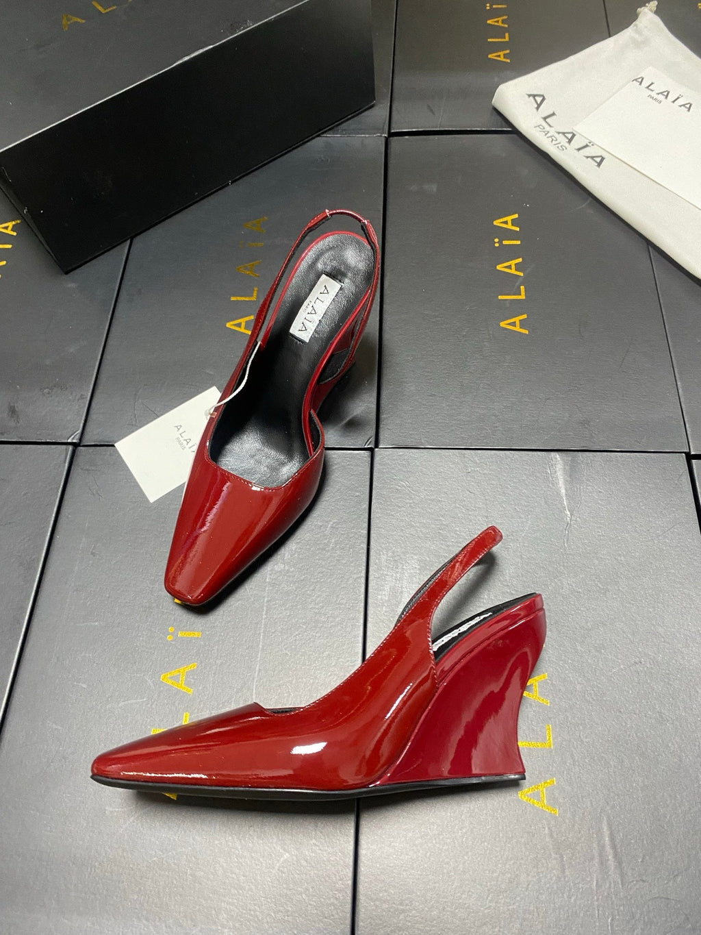 ALAIA 26S WEDGE SLINGBACKS 95 MM IN DARK RED PATENT CALFSKIN
