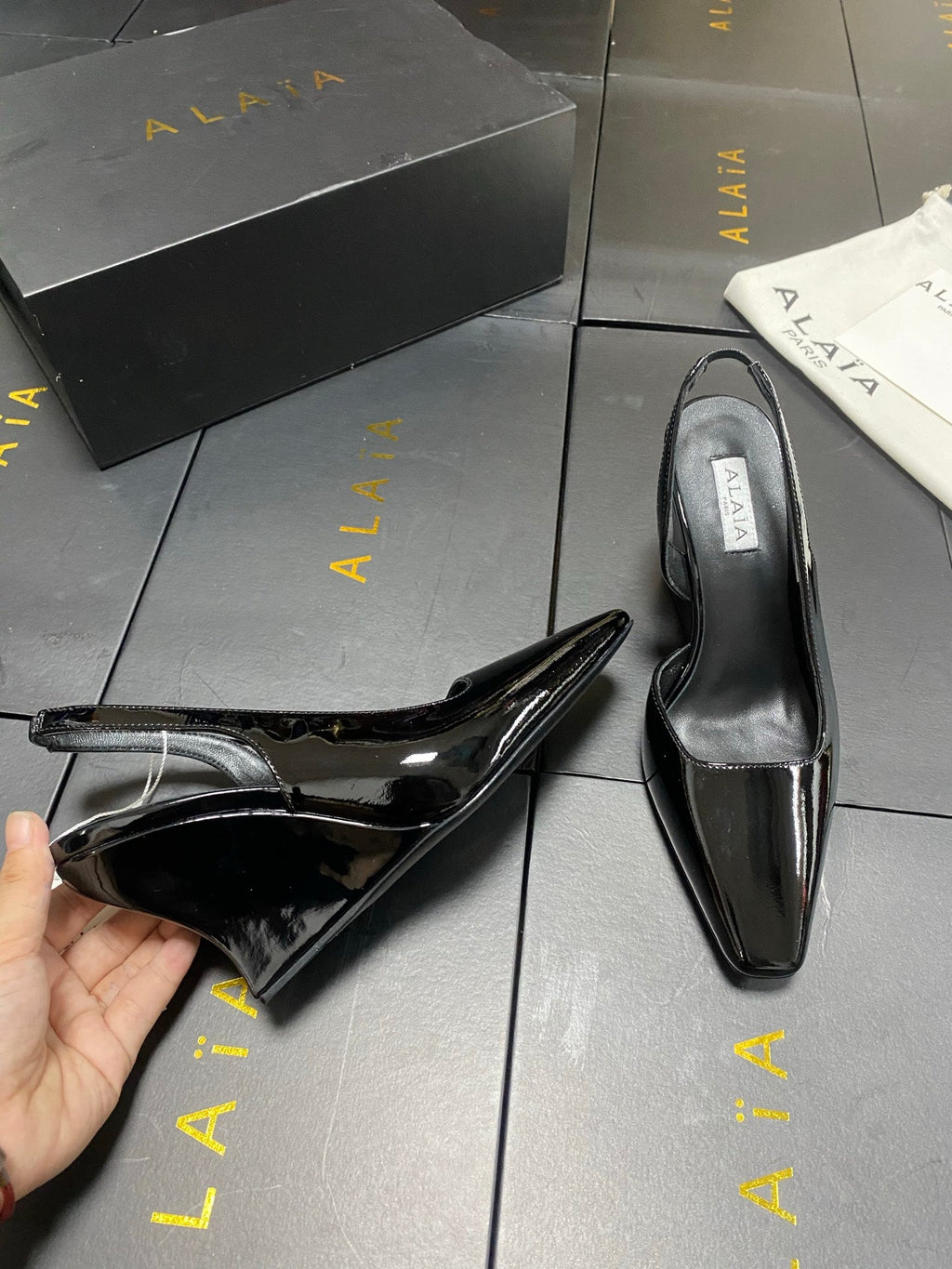 ALAIA 26S WEDGE SLINGBACKS 95 MM IN BLACK PATENT CALFSKIN