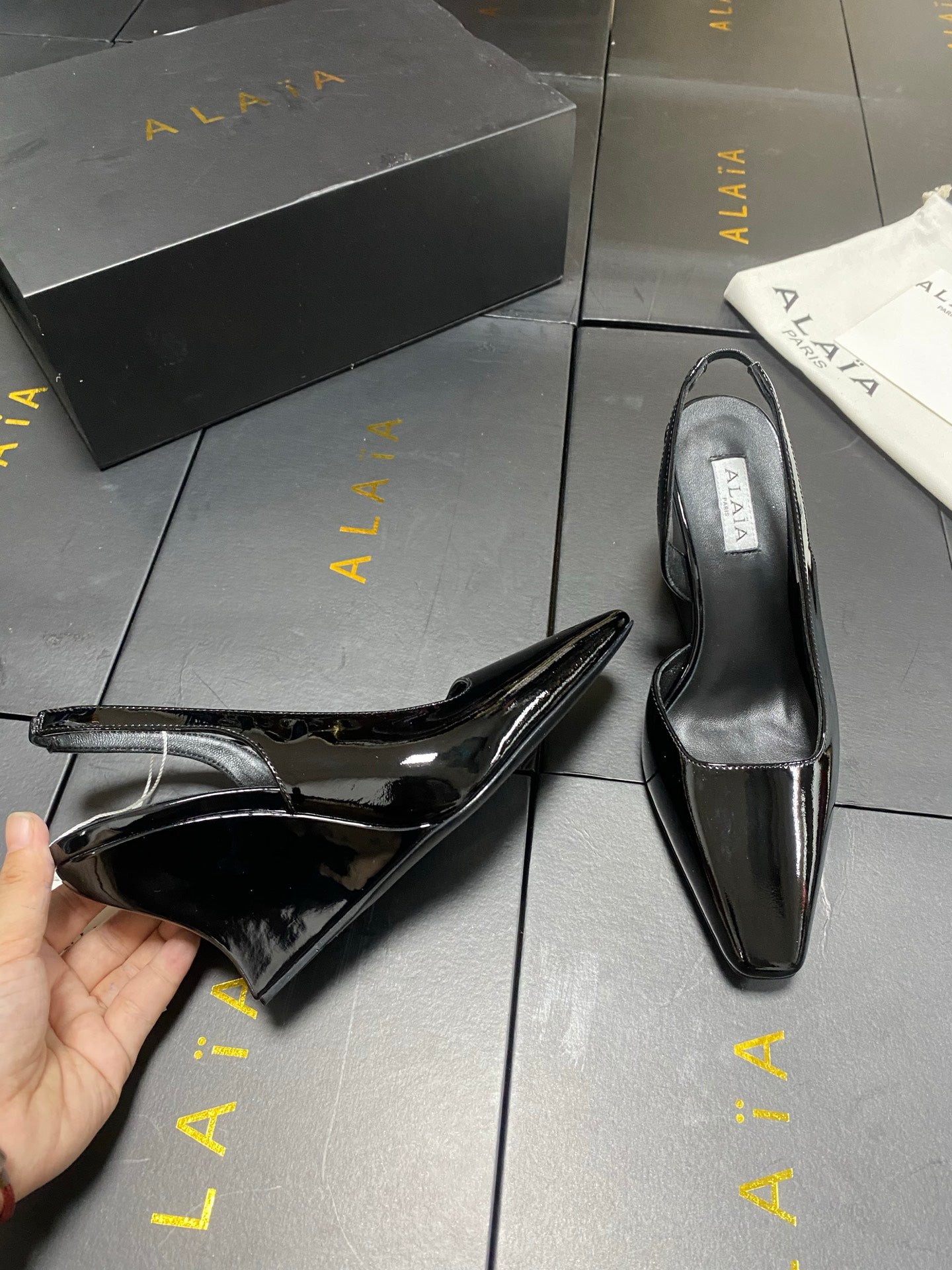 ALAIA 26S WEDGE SLINGBACKS 95 MM IN BLACK PATENT CALFSKIN