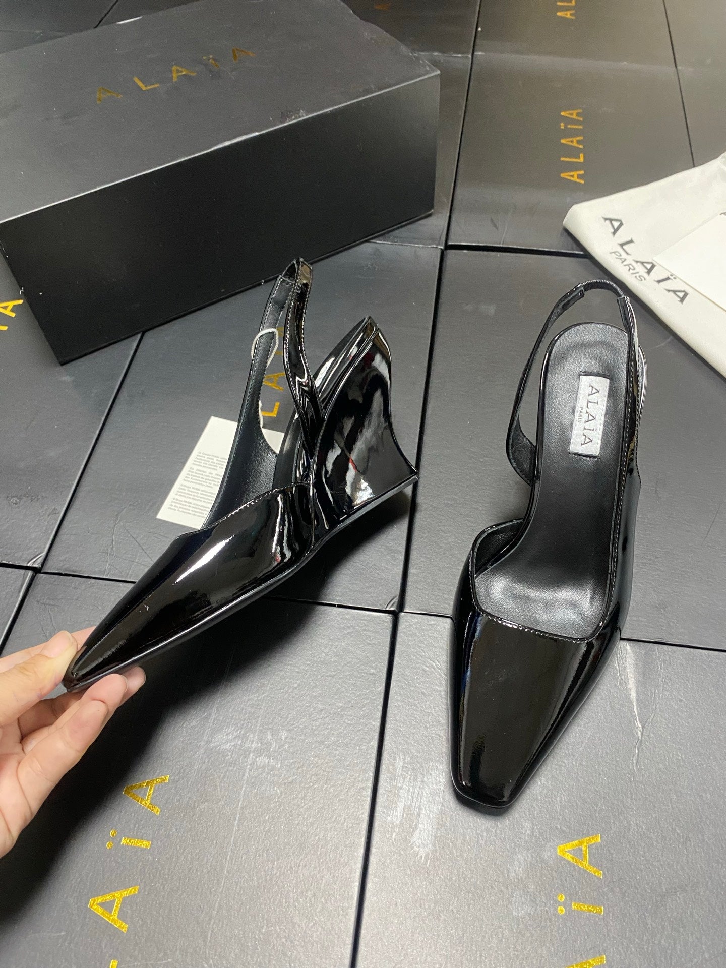 ALAIA 26S WEDGE SLINGBACKS 95 MM IN BLACK PATENT CALFSKIN