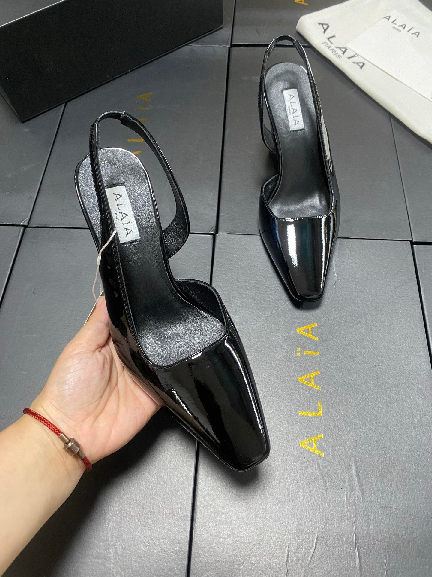 ALAIA 26S WEDGE SLINGBACKS 95 MM IN BLACK PATENT CALFSKIN