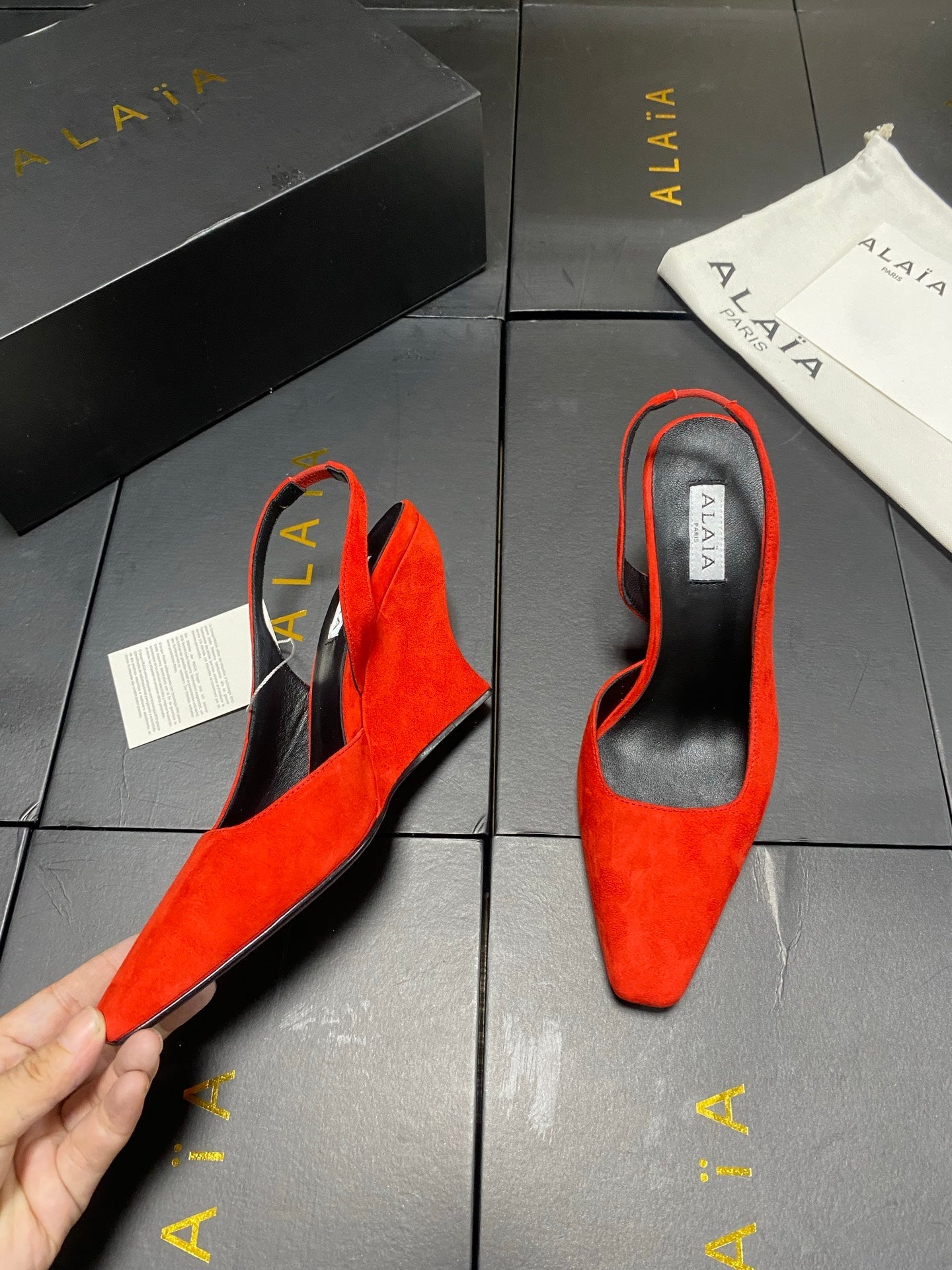 ALAIA 26S WEDGE SLINGBACKS 95 MM IN ORANGE RED SUEDE