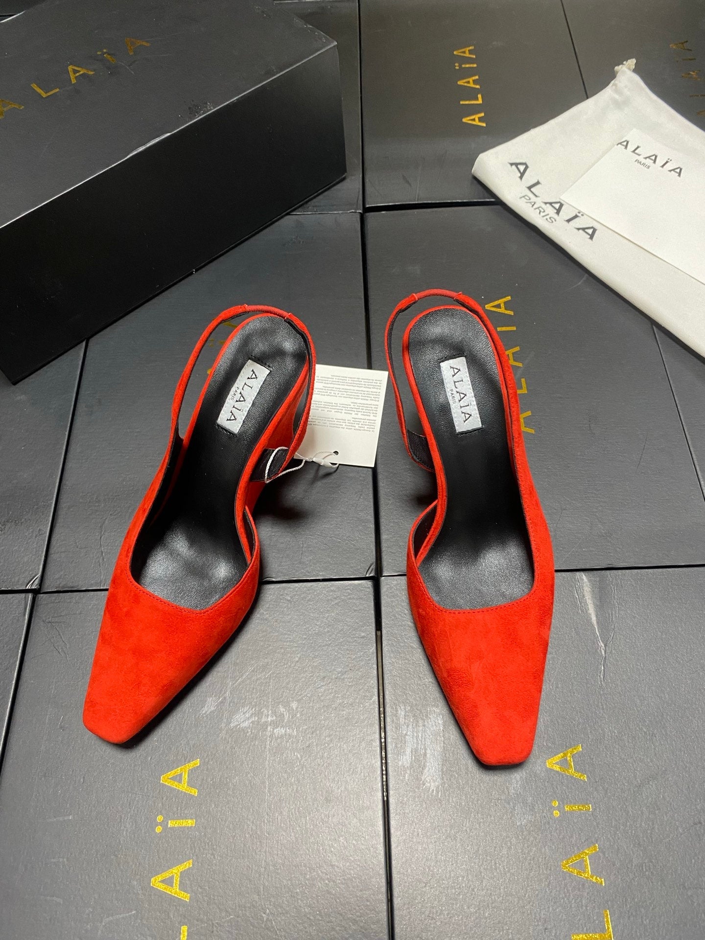 ALAIA 26S WEDGE SLINGBACKS 95 MM IN ORANGE RED SUEDE