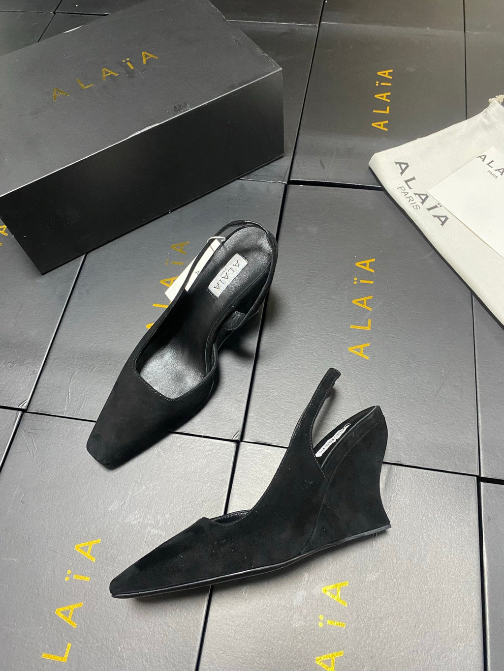 ALAIA 26S WEDGE SLINGBACKS 95 MM IN BLACK SUEDE