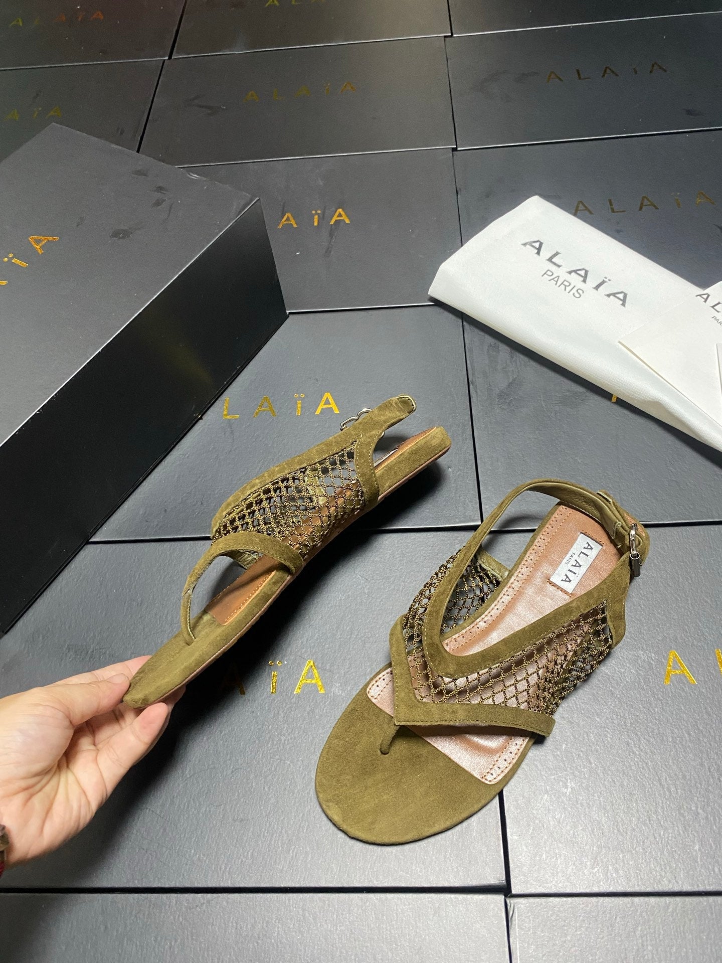 ALAIA 26S FLAT MESH THONG SANDALS MM IN MOSS GREEN SUEDE