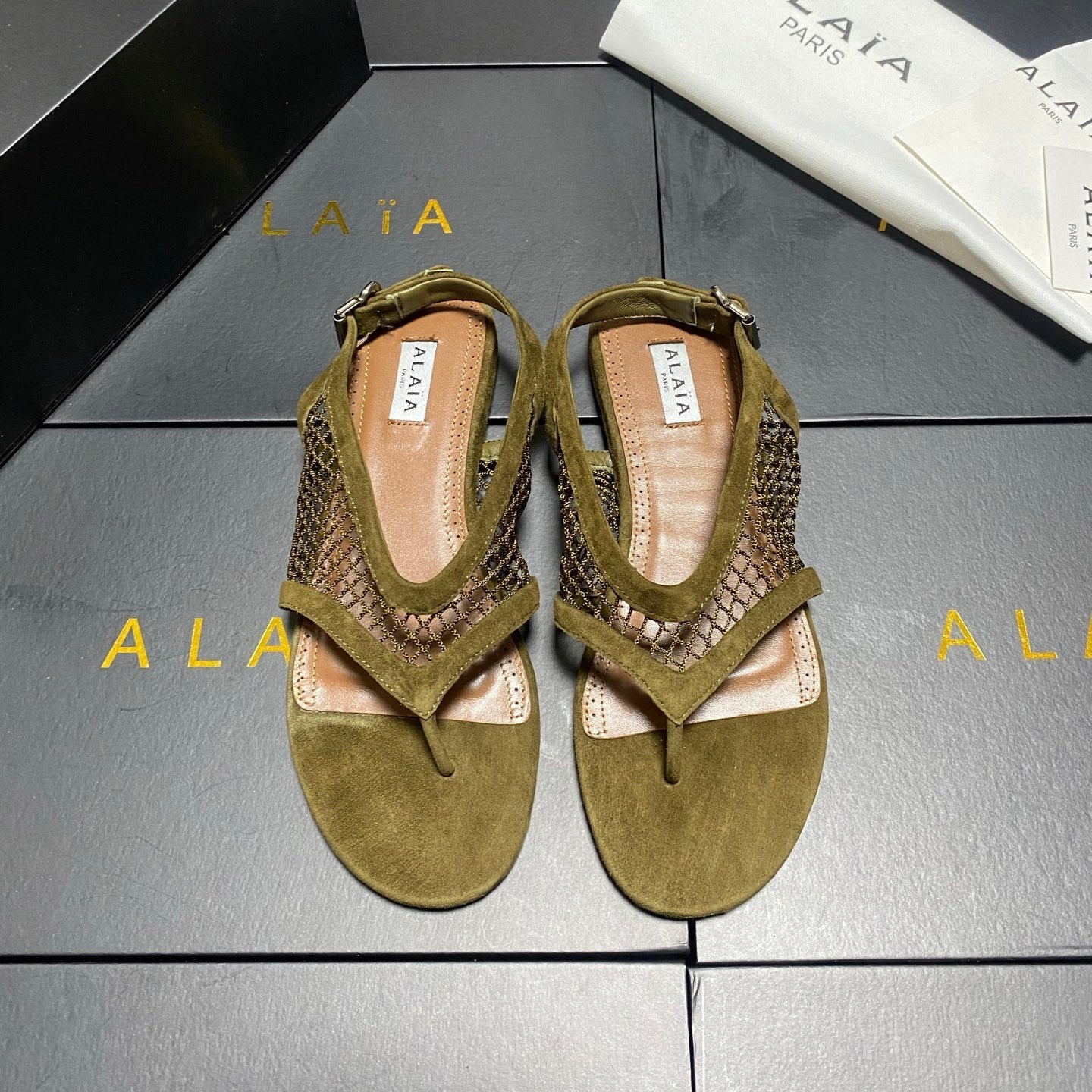 ALAIA 26S FLAT MESH THONG SANDALS MM IN MOSS GREEN SUEDE