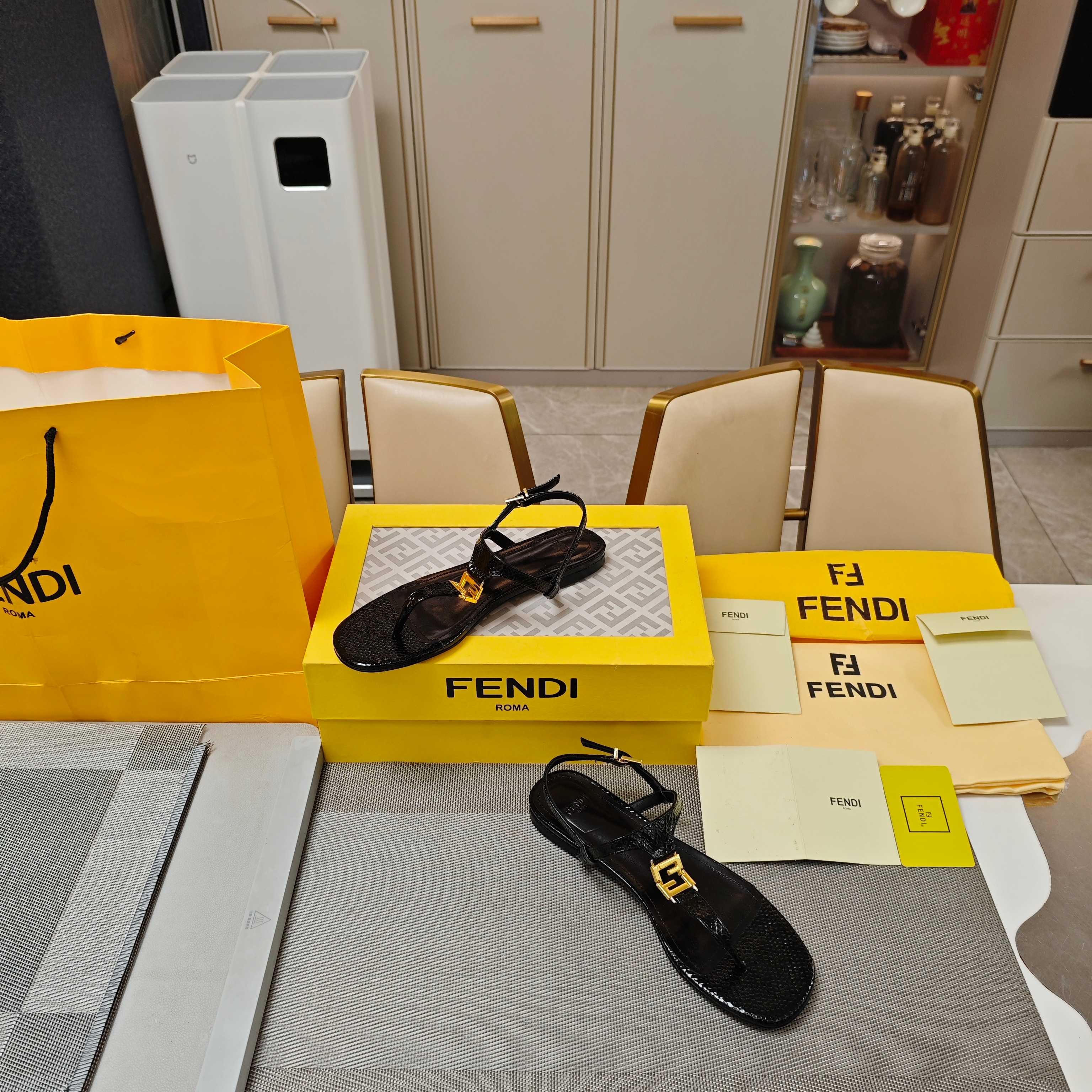 FENDI 26S FLIP-FLOP SANDALS IN BLACK CALFSKIN