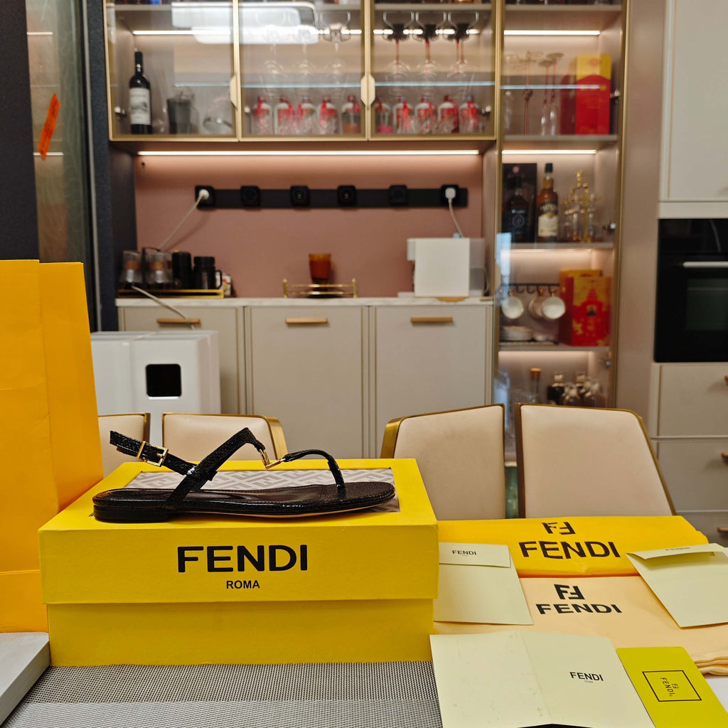 FENDI 26S FLIP-FLOP SANDALS IN BLACK CALFSKIN