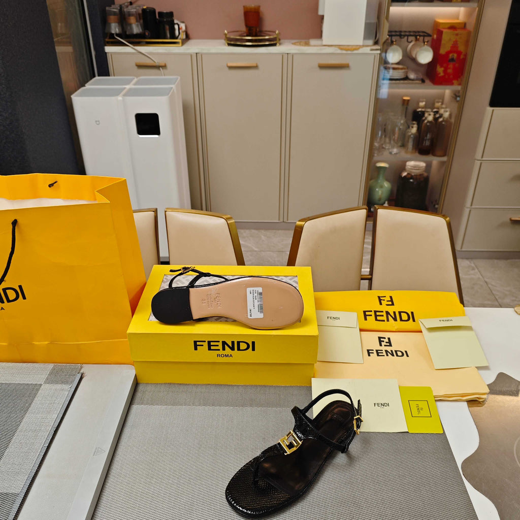 FENDI 26S FLIP-FLOP SANDALS IN BLACK CALFSKIN