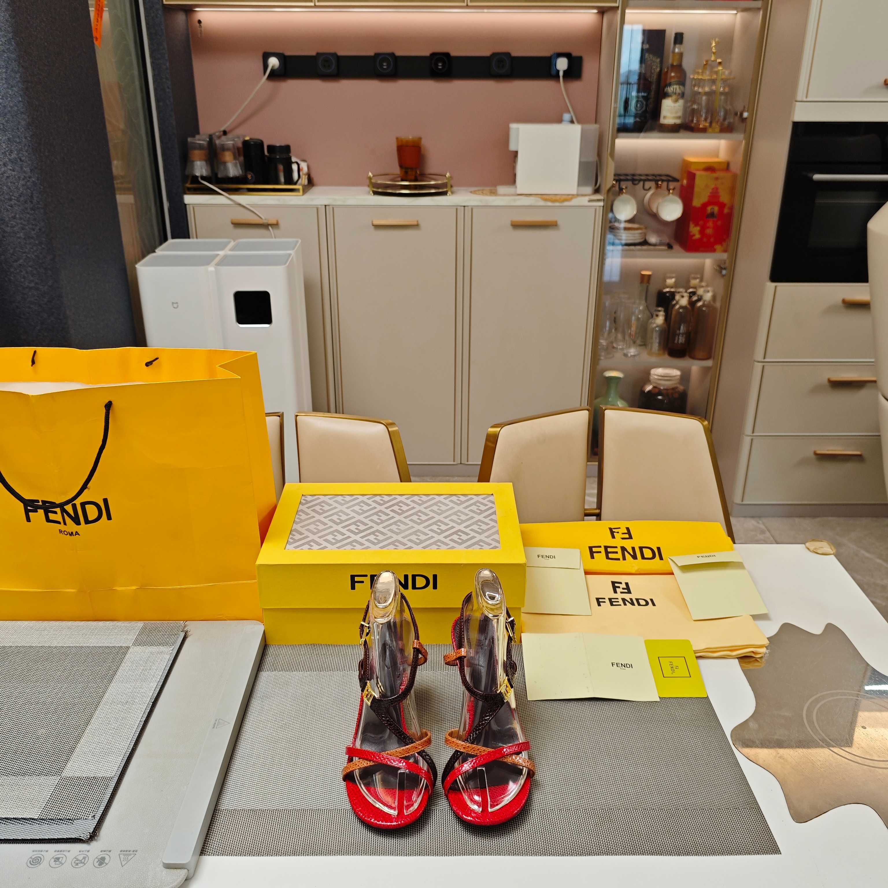 FENDI 26S HIGH-HEELED SANDALS 85 MM IN RED AND BLACK CALFSKIN