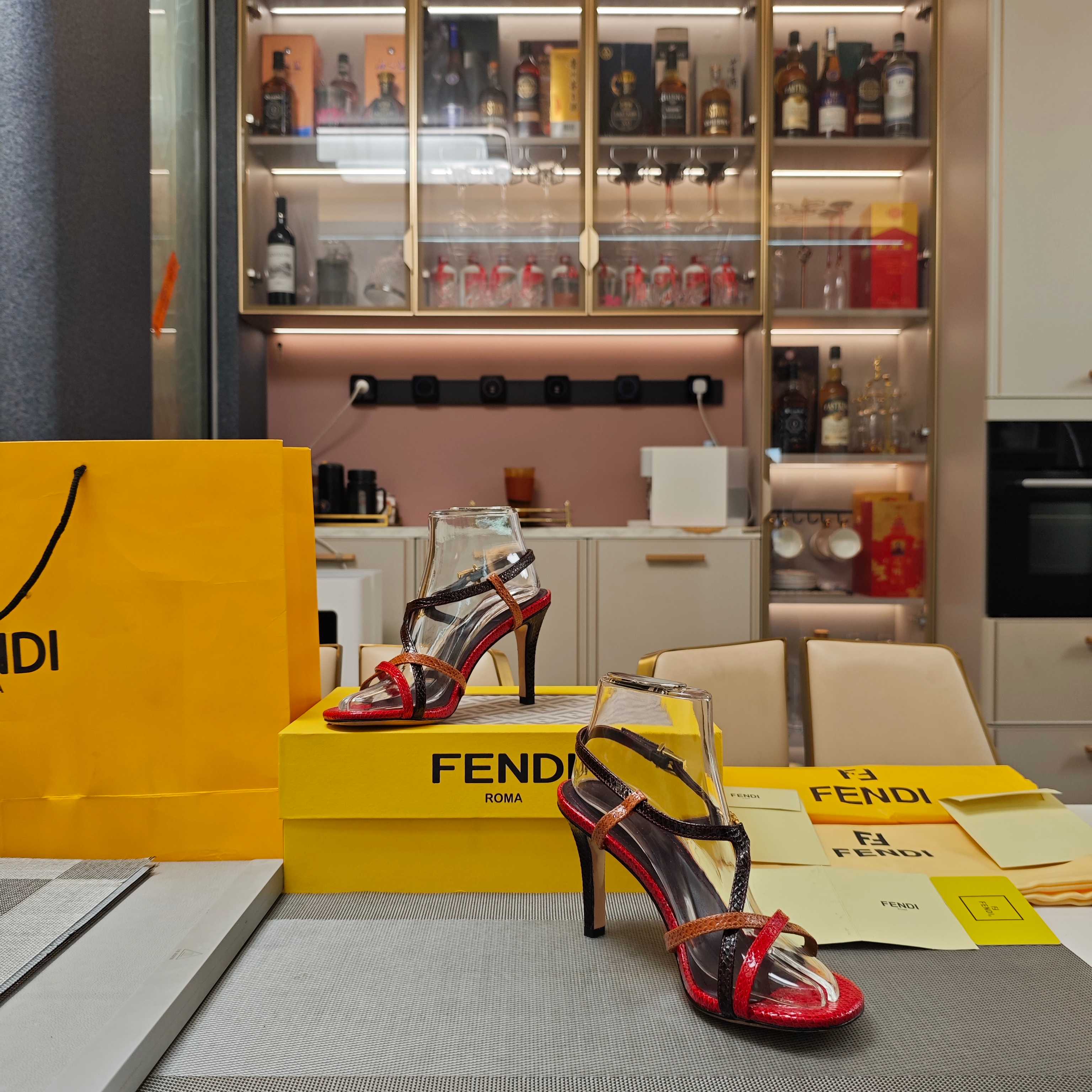 FENDI 26S HIGH-HEELED SANDALS 85 MM IN RED AND BLACK CALFSKIN