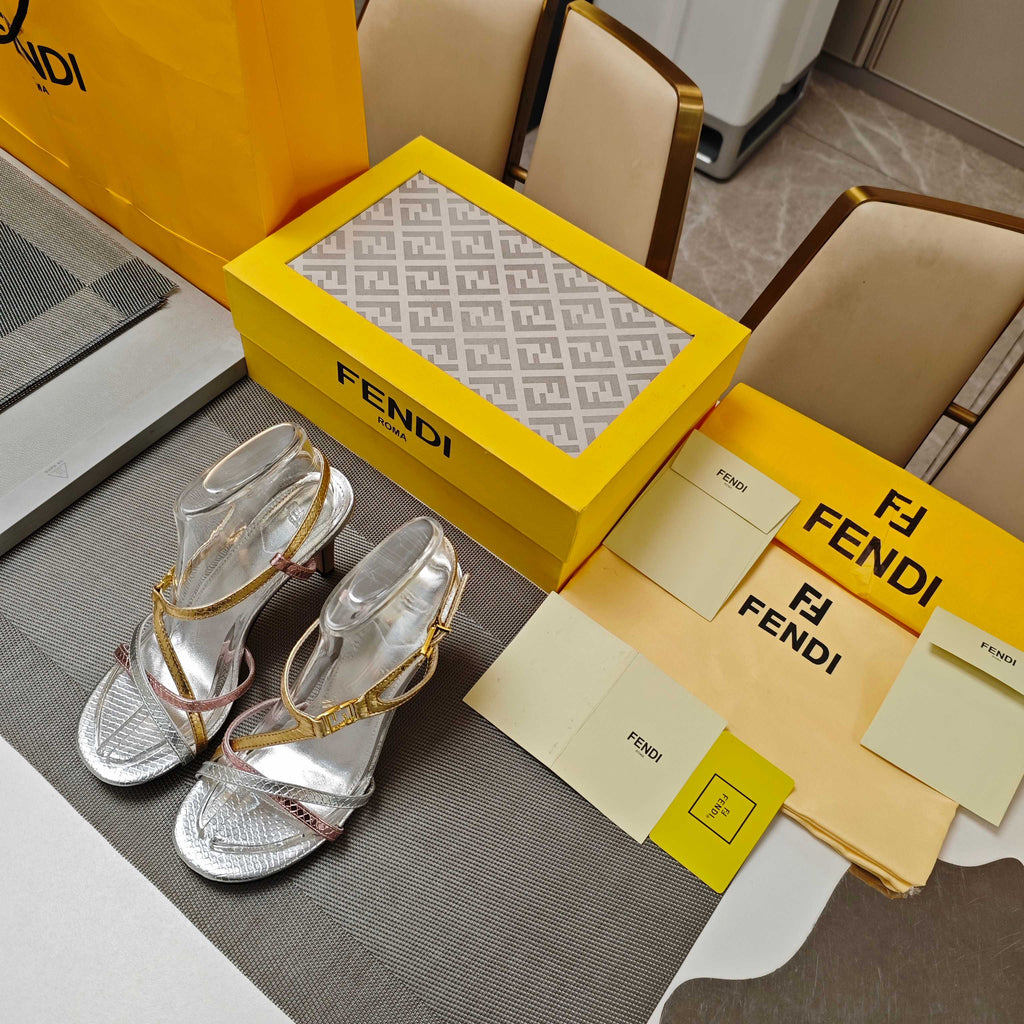 FENDI 26S HIGH-HEELED SANDALS 85 MM IN SILVER AND GOLD CALFSKIN