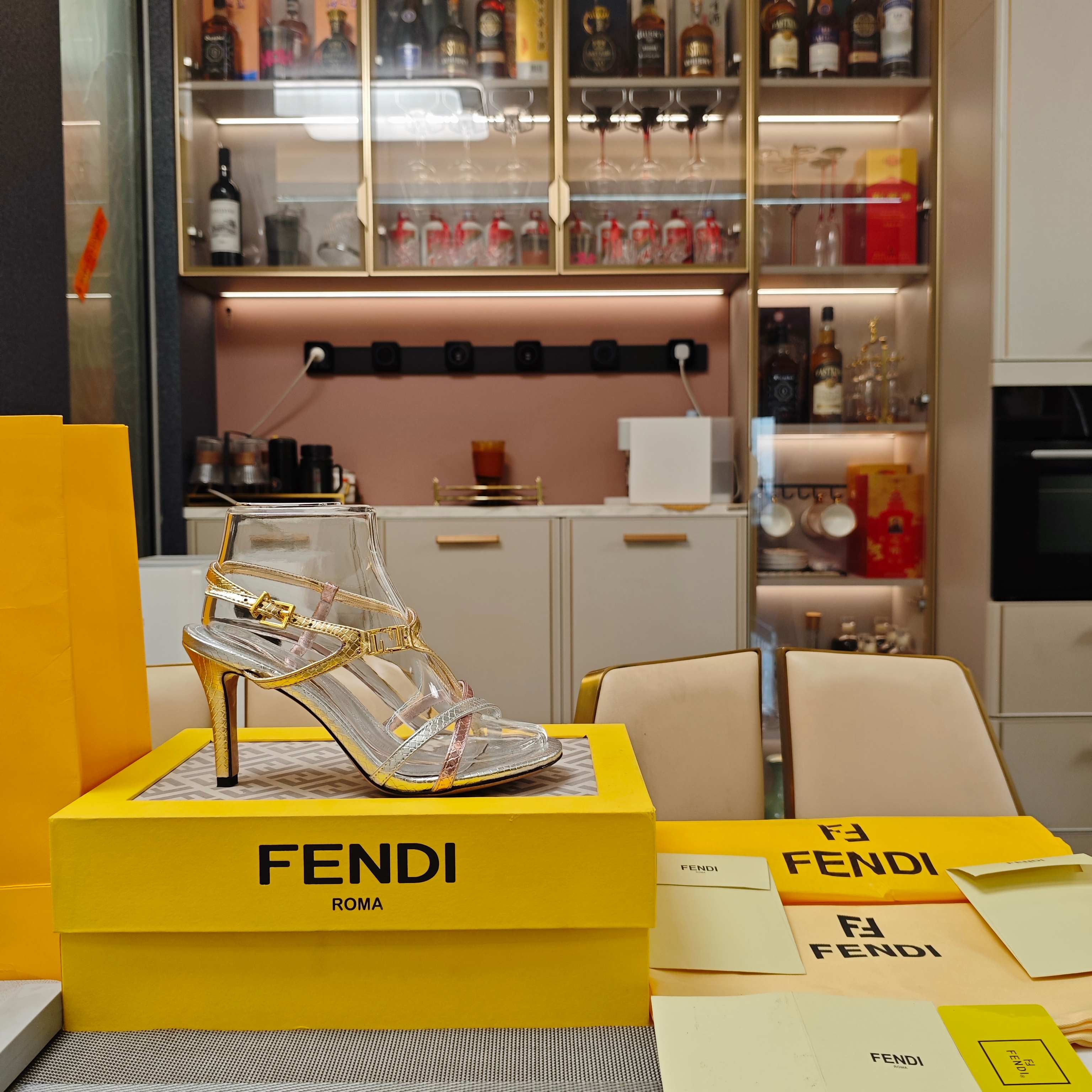 FENDI 26S HIGH-HEELED SANDALS 85 MM IN SILVER AND GOLD CALFSKIN
