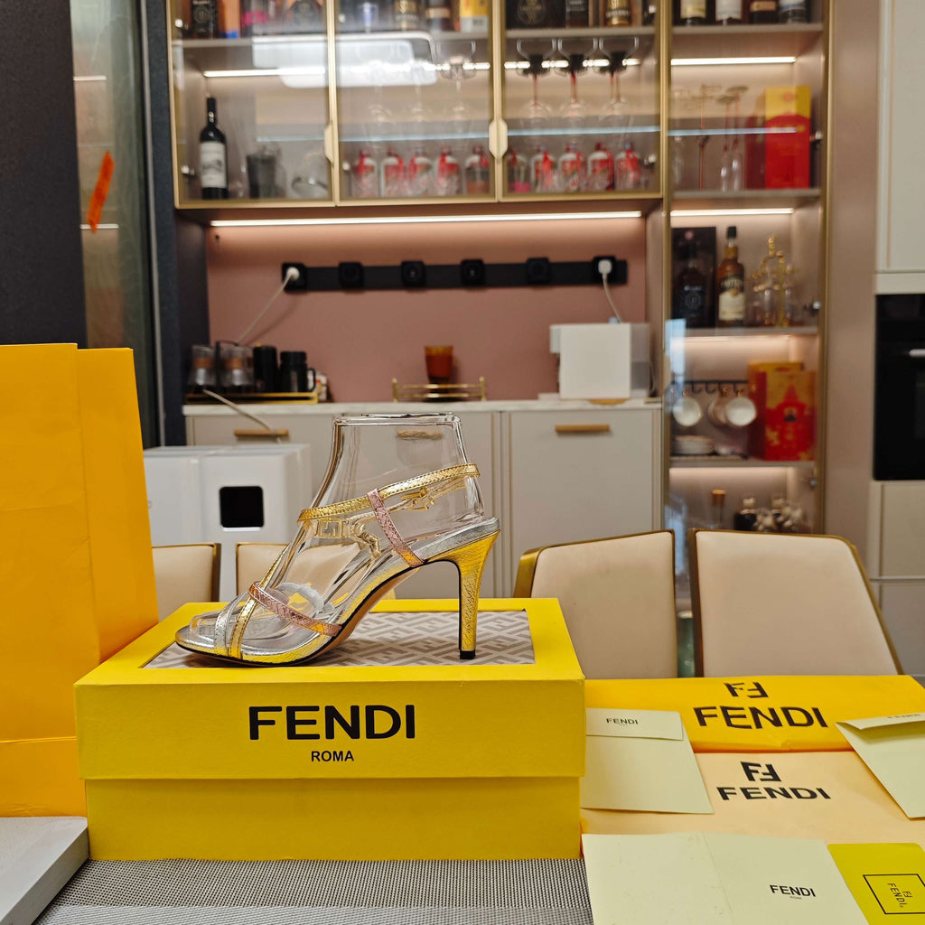 FENDI 26S HIGH-HEELED SANDALS 85 MM IN SILVER AND GOLD CALFSKIN