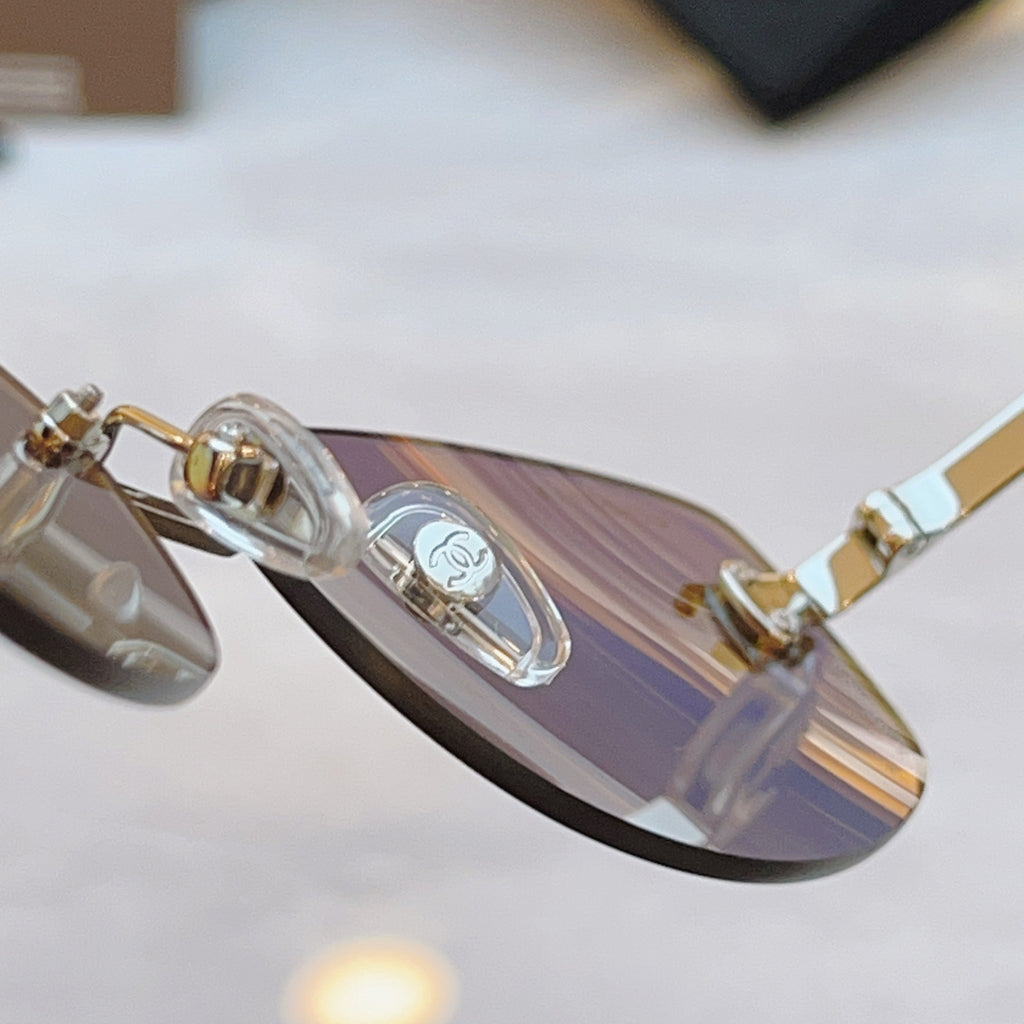 CHANEL RECTANGLE SUNGLASSES IN METAL 941998