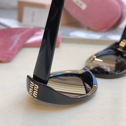 MIUMIU 26S OVAL FRAME IN ACETATE 415246