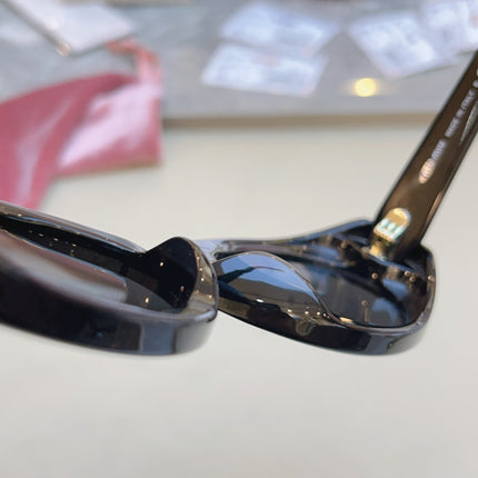 MIUMIU 26S OVAL FRAME IN ACETATE 415246