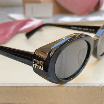 MIUMIU 26S OVAL FRAME IN ACETATE 415246