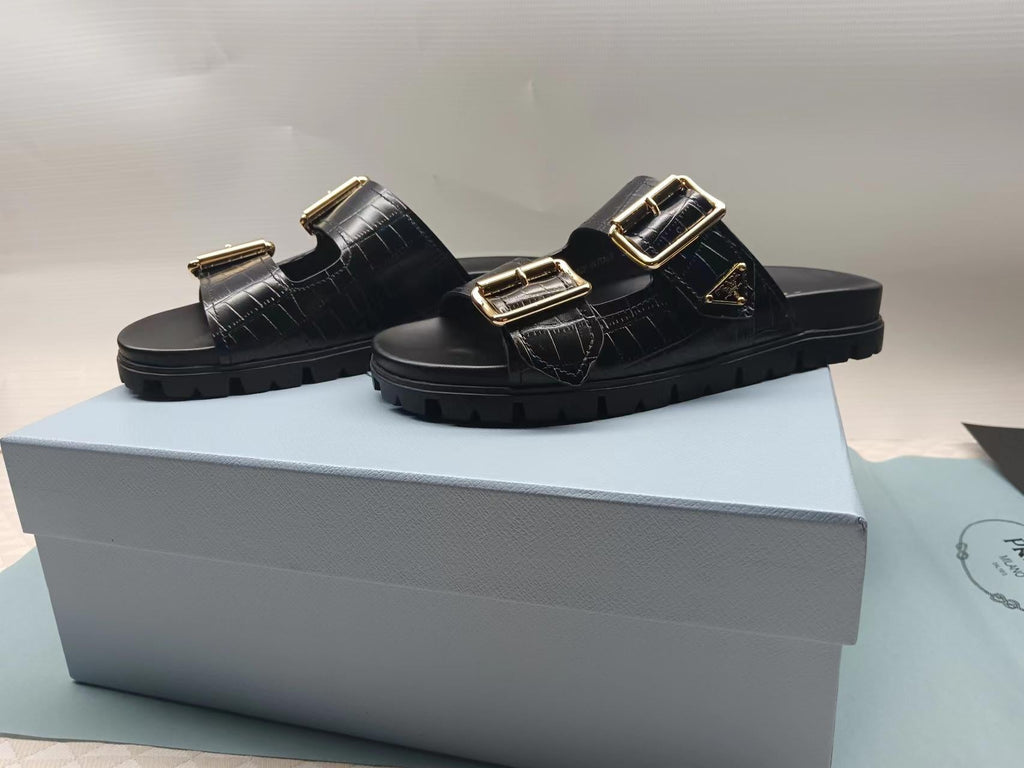 PRADA 26S STRAP SLIDES IN BLACK CROC EMBOSSED CALFSKIN GOLD HARDWARE