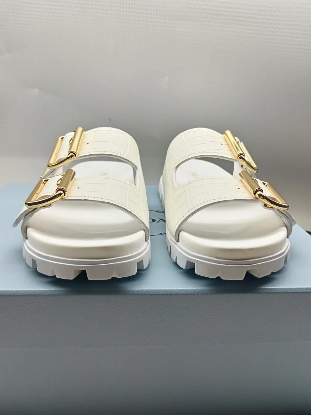 PRADA 26S STRAP SLIDES IN IVORY WHITE CROC EMBOSSED CALFSKIN GOLD HARDWARE