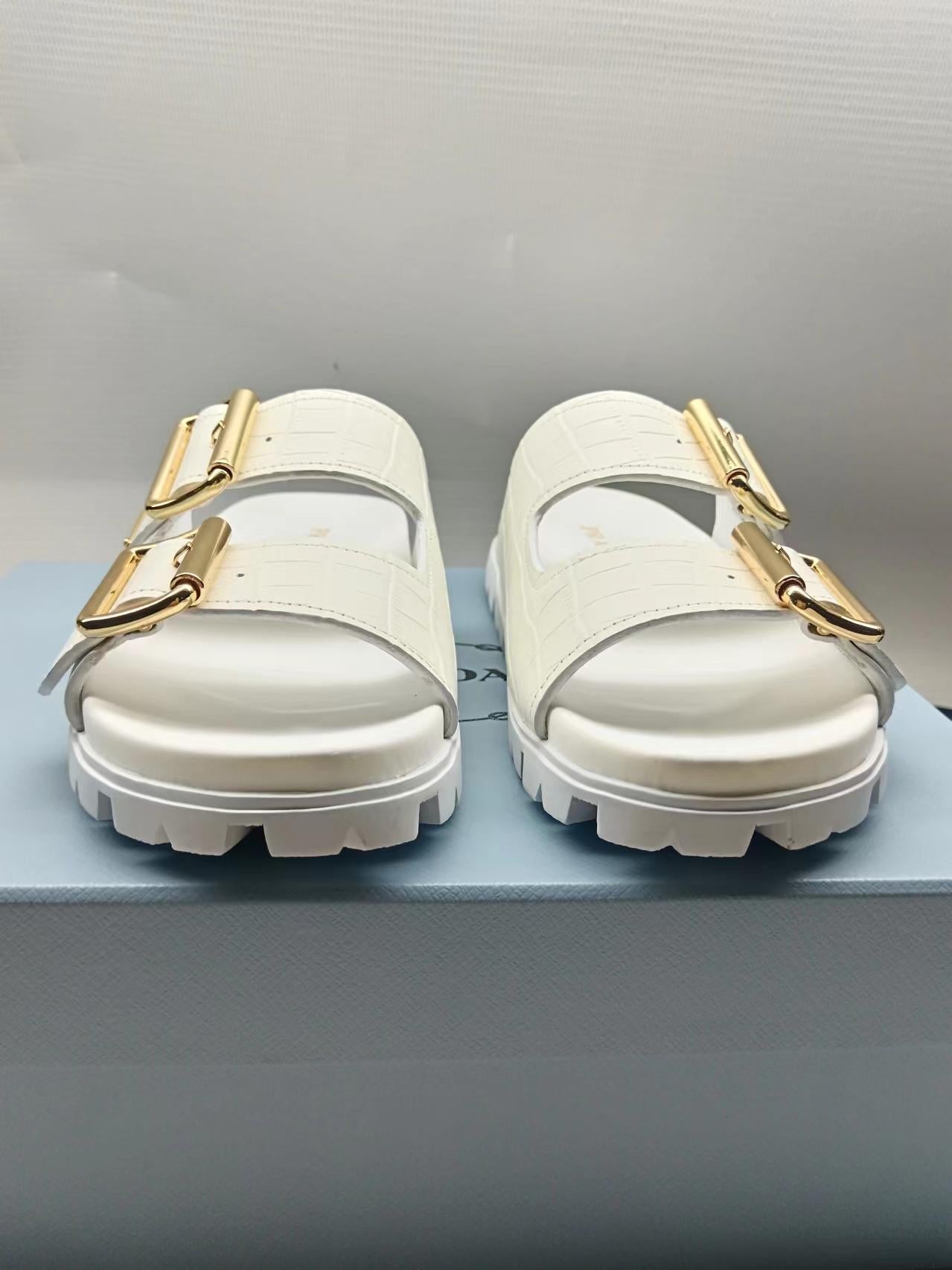 PRADA 26S STRAP SLIDES IN IVORY WHITE CROC EMBOSSED CALFSKIN GOLD HARDWARE