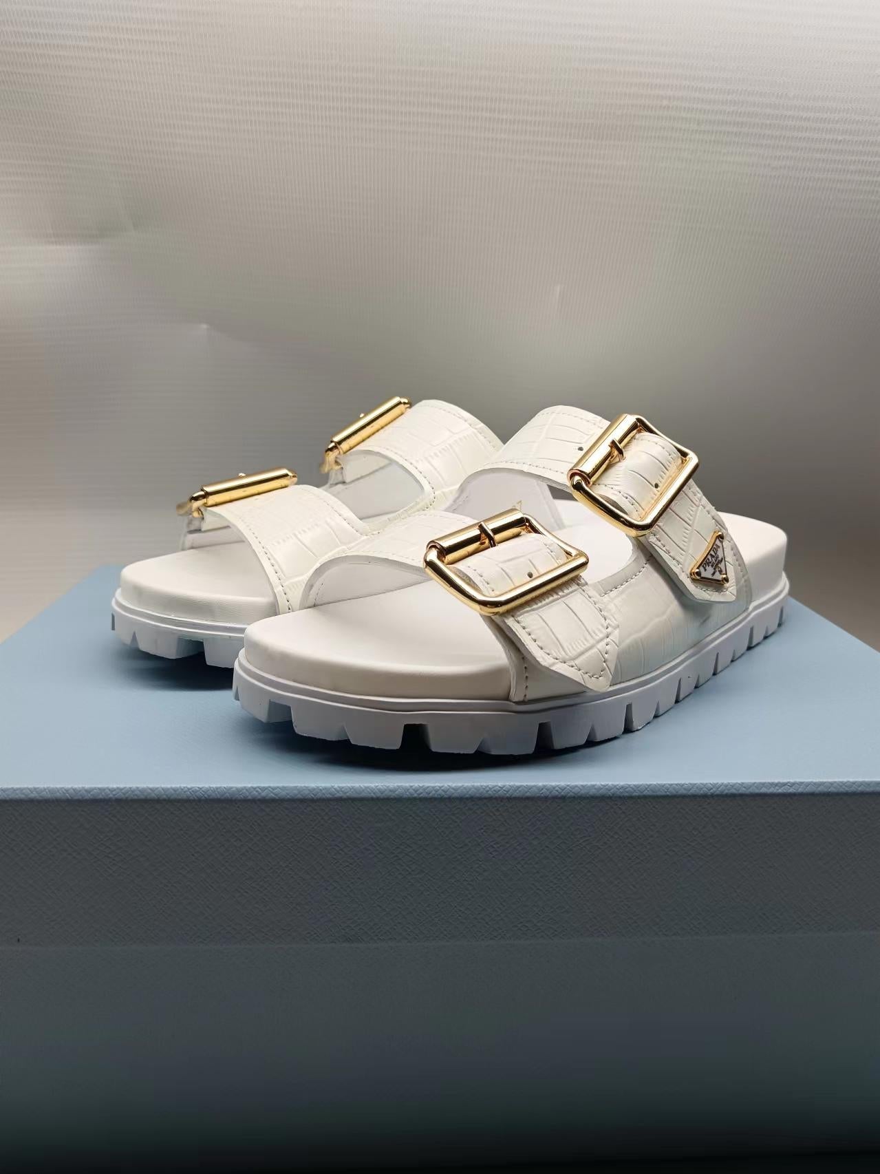 PRADA 26S STRAP SLIDES IN IVORY WHITE CROC EMBOSSED CALFSKIN GOLD HARDWARE