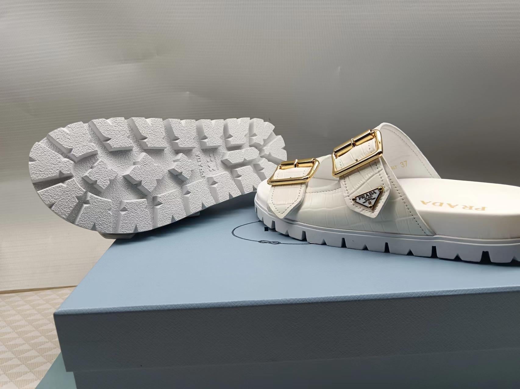 PRADA 26S STRAP SLIDES IN IVORY WHITE CROC EMBOSSED CALFSKIN GOLD HARDWARE