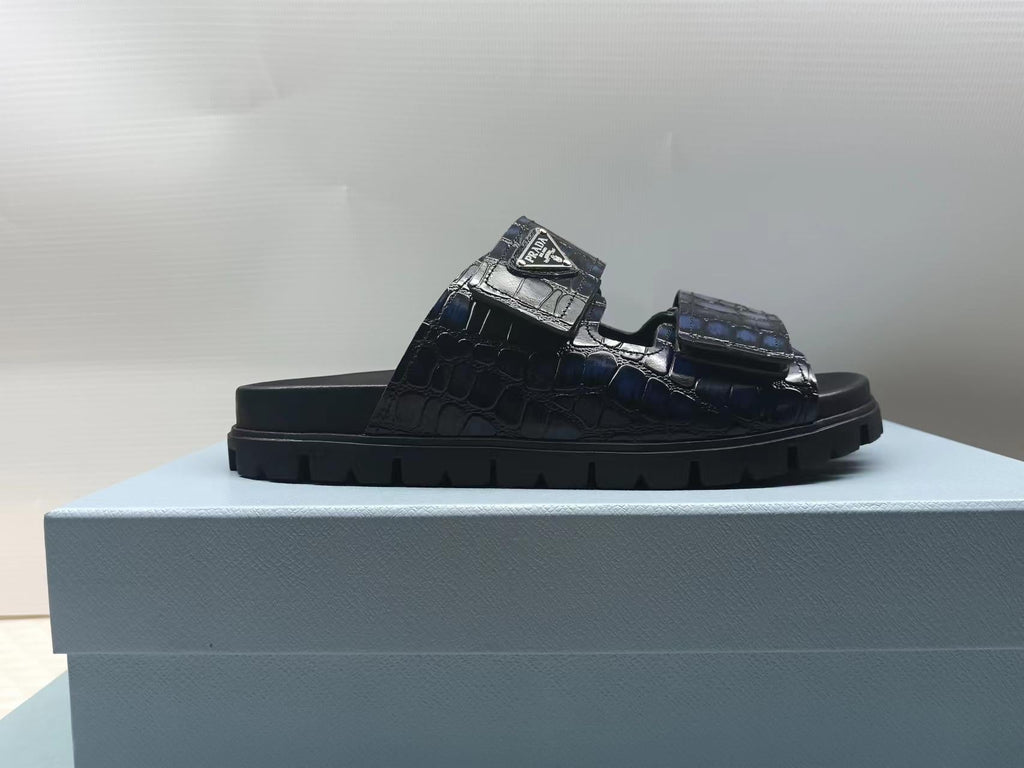 PRADA 26S STRAP SLIDES IN BLACK CROC EMBOSSED CALFSKIN