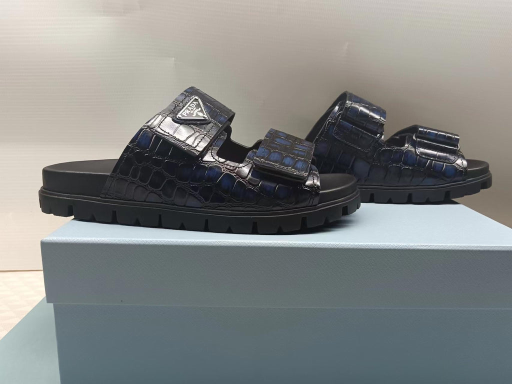 PRADA 26S STRAP SLIDES IN BLACK CROC EMBOSSED CALFSKIN