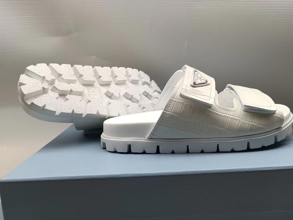 PRADA 26S STRAP SLIDES IN IVORY WHITE CROC EMBOSSED CALFSKIN